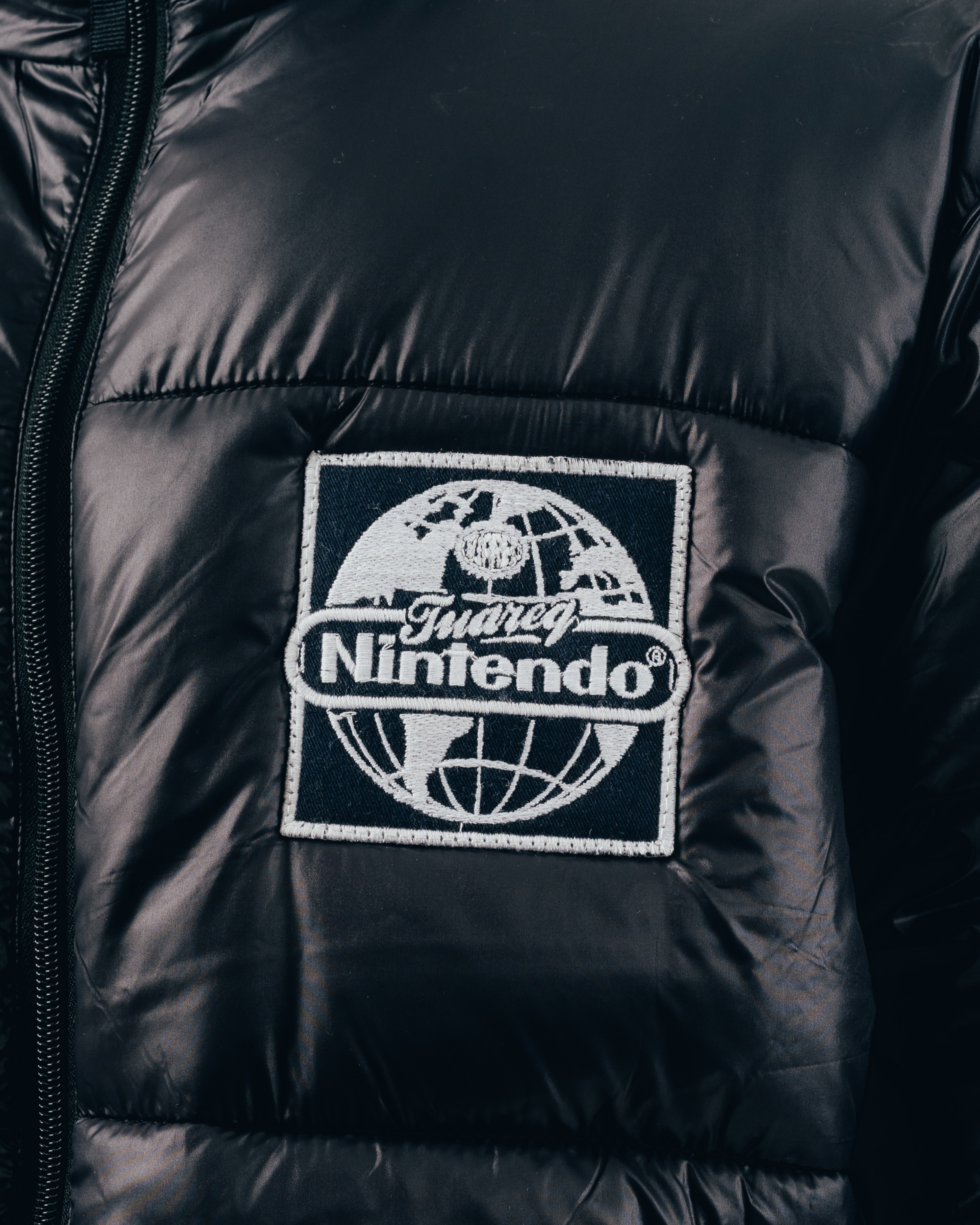 CAMPERA PUFFER [ NINTENDO  ] WORLD BLACK